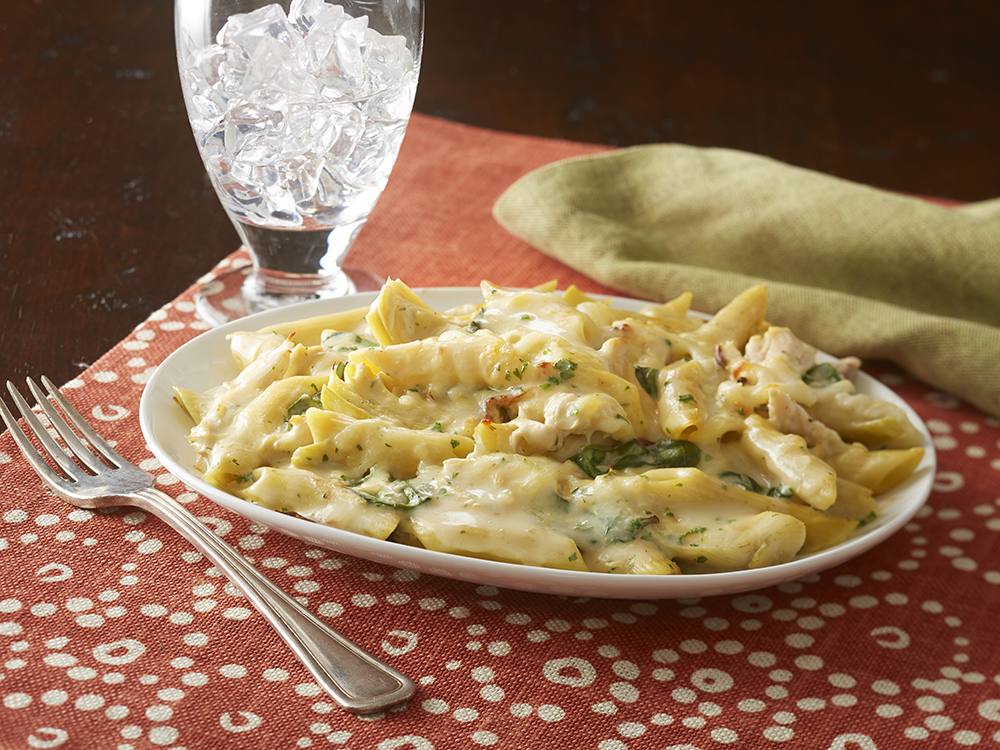 Tyson® Spinach, Chicken, and Artichoke Pasta Bake | Savory