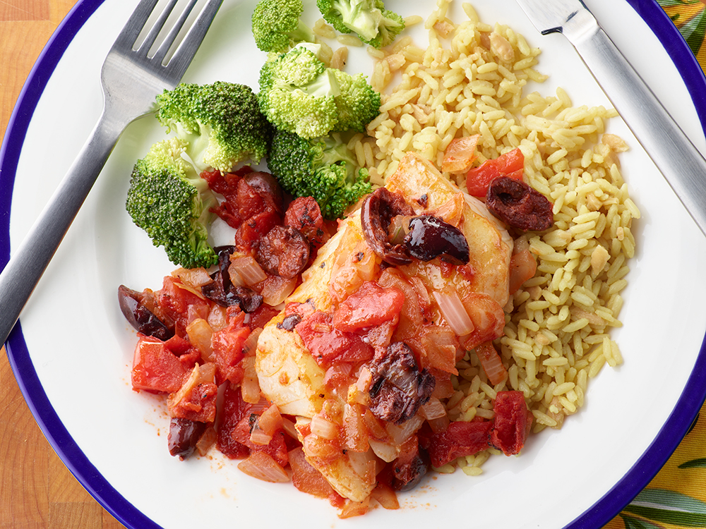 Pan Seared Halibut with Tomato Olive Sauce | Savory