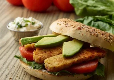 TLT Bagel Sandwich (Tempeh, Lettuce, Tomato) with Avocado and Basil Mayo