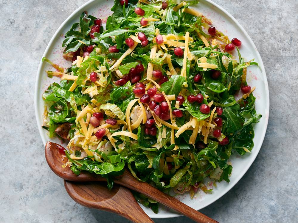 Brussels Sprout and Arugula Salad with Pomegranate Dressing | Savory