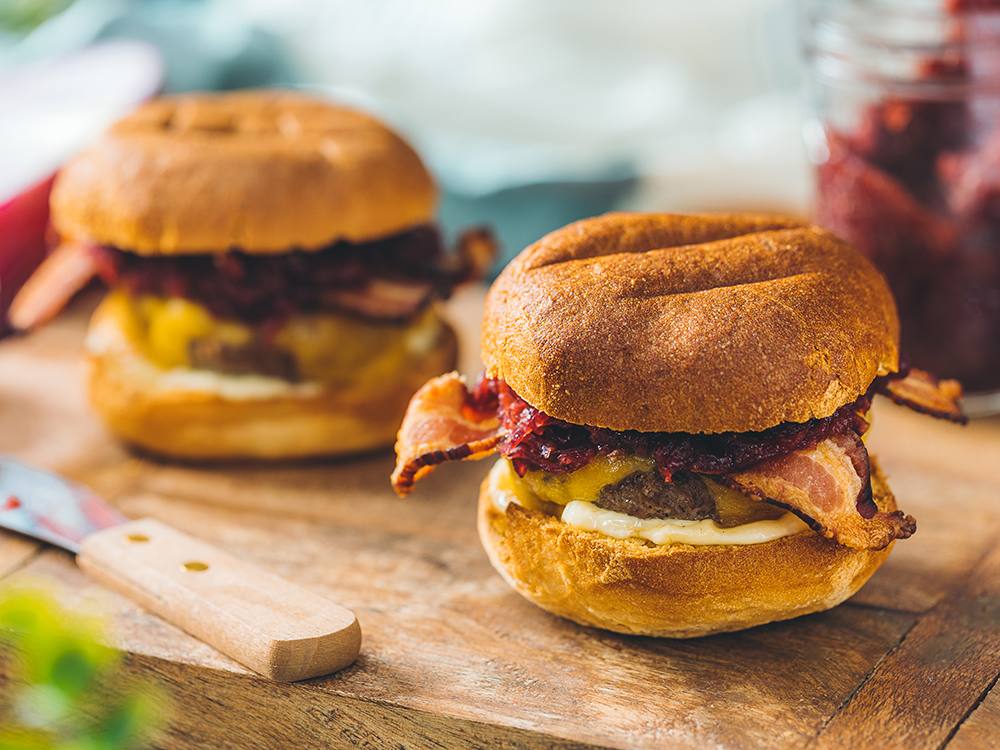 Canyon Bakehouse® Bacon Cheddar Burgers with Red Onion Jam | Savory