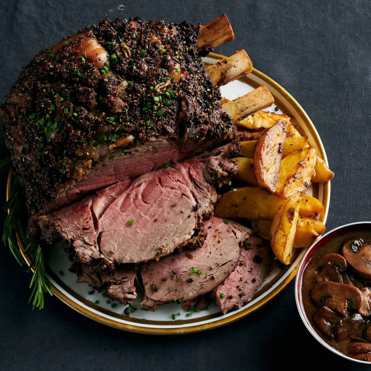Standing Rib Roast with Potatoes and Mushroom Red Wine Jus Savory