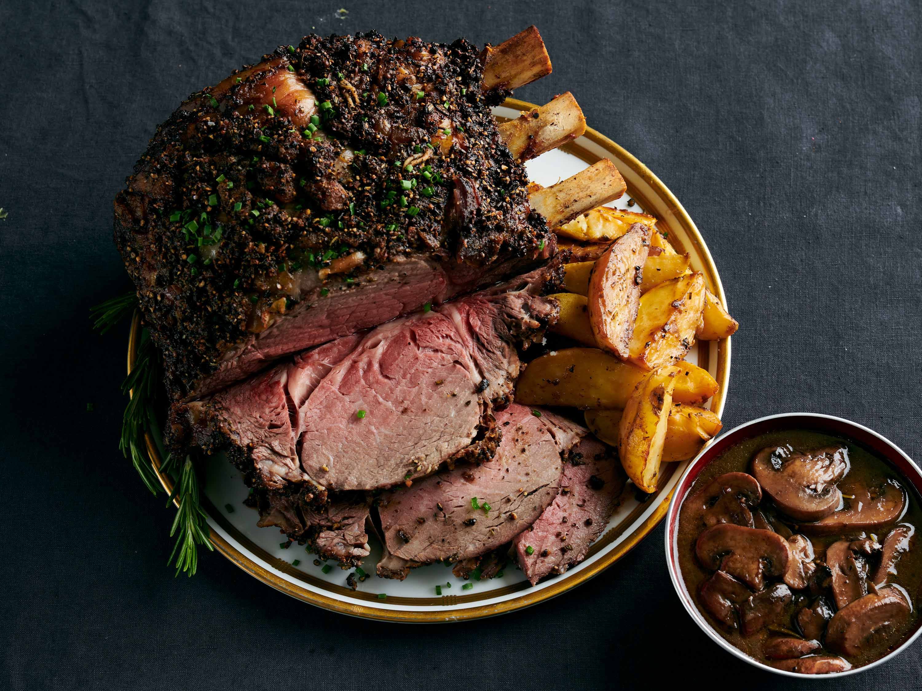 Standing Rib Roast with Potatoes and Mushroom Red Wine Jus Savory