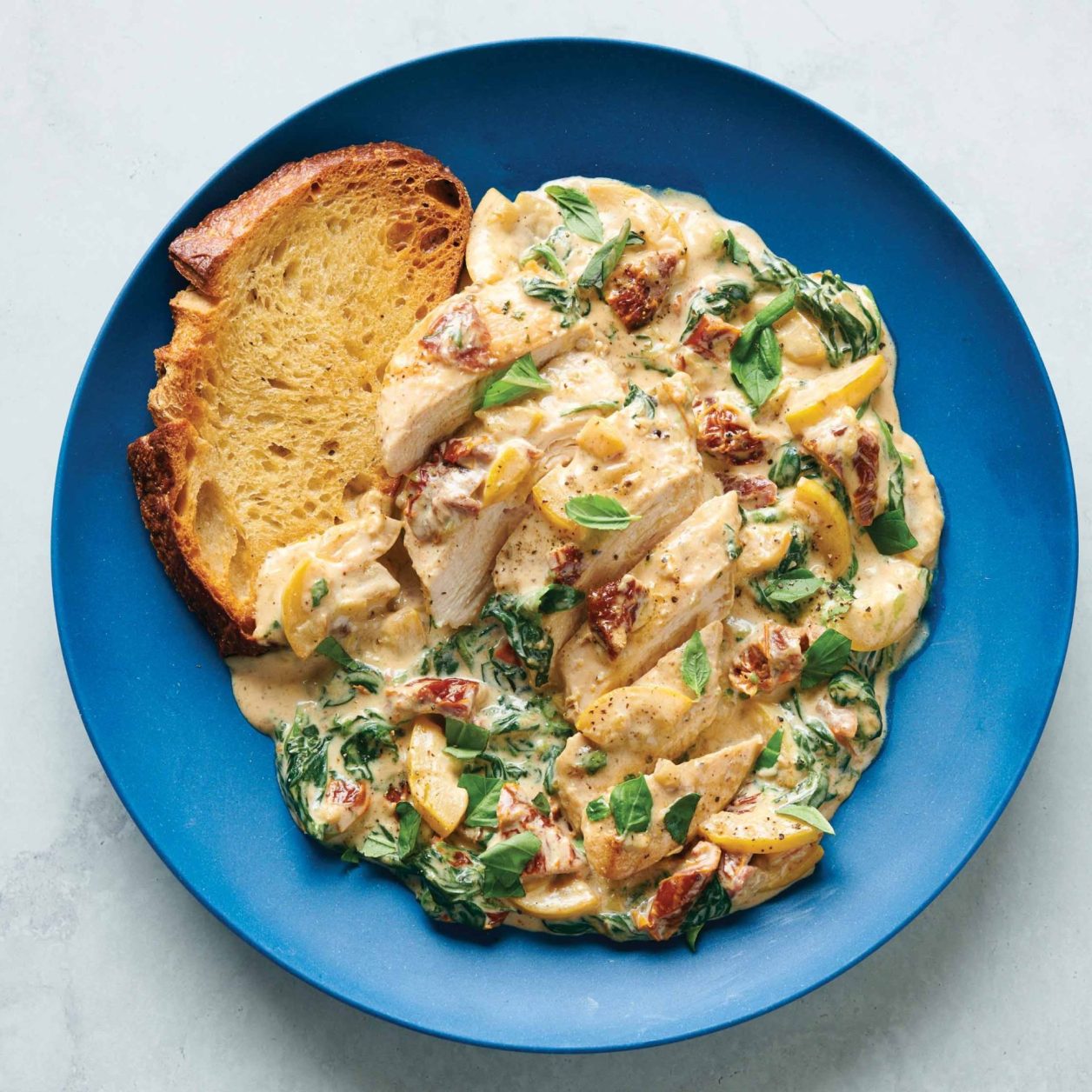 Creamy Sun Dried Tomato Chicken Parmesan with Crusty Bread Savory