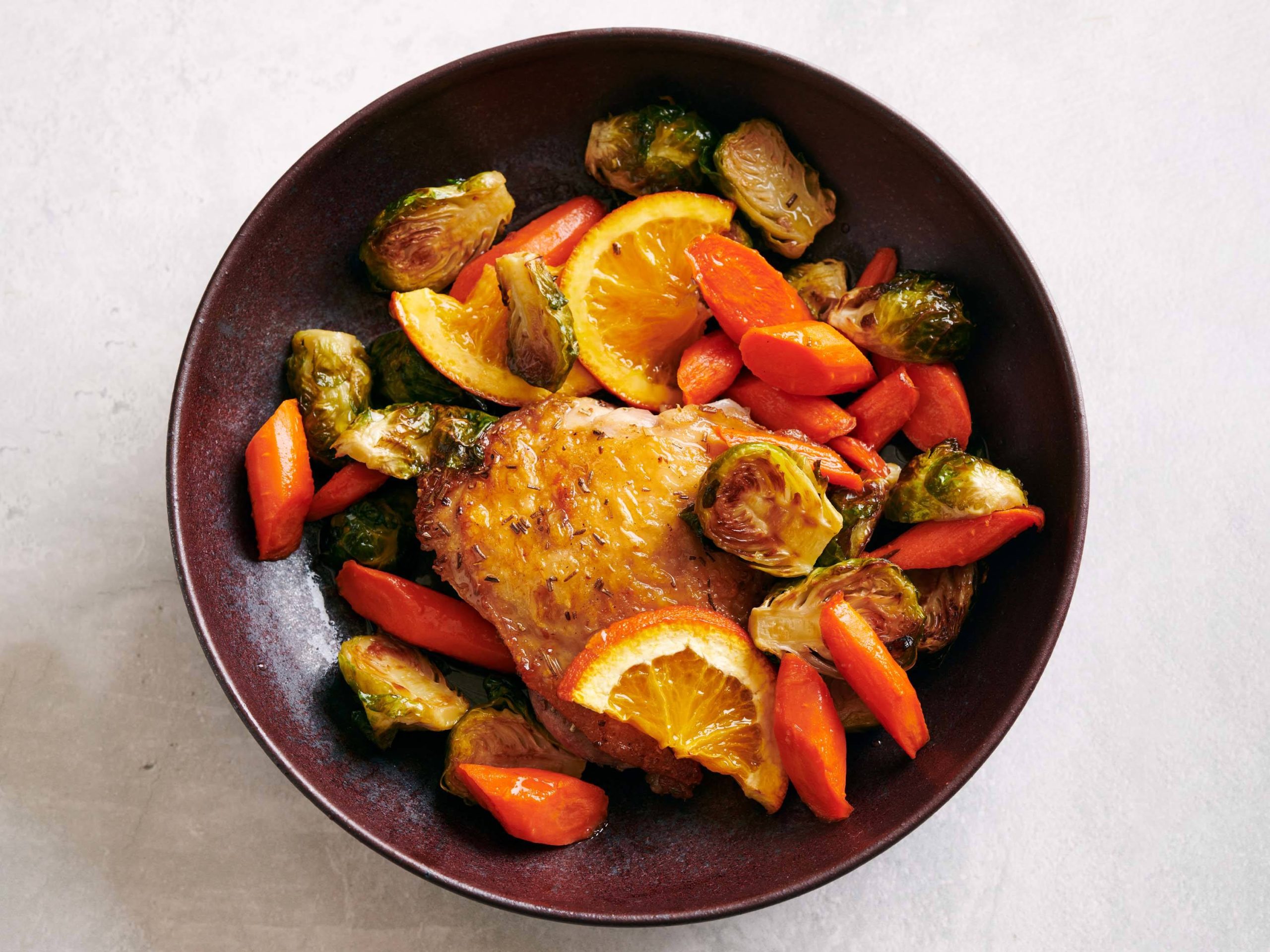 Orange-Rosemary Roasted Chicken Thighs with Brussels Sprouts and Carrots | Savory