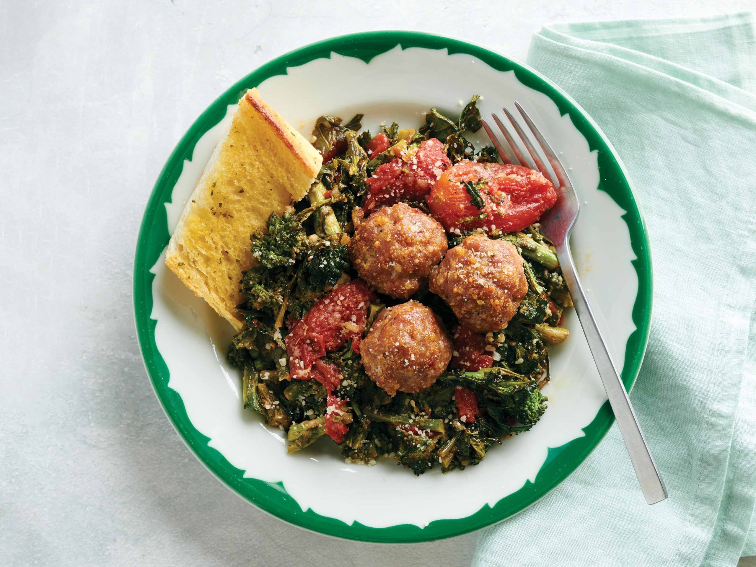 Sausage Meatballs with Tomatoes and Broccoli Rabe | Savory