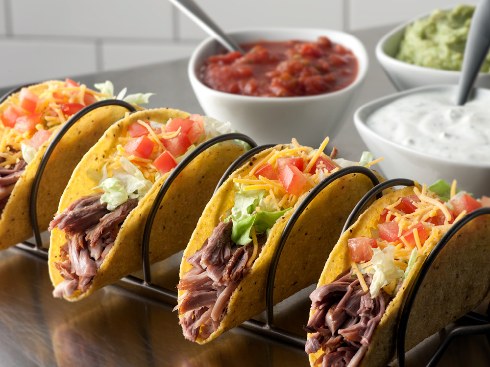 Pulled Pork Tacos with Cilantro-Lime Sour Cream | Savory