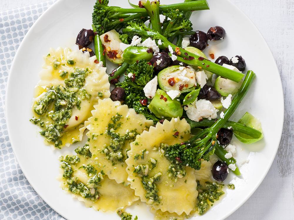 Pesto Ravioli with Brussels Sprouts and Broccolini Salad | Savory